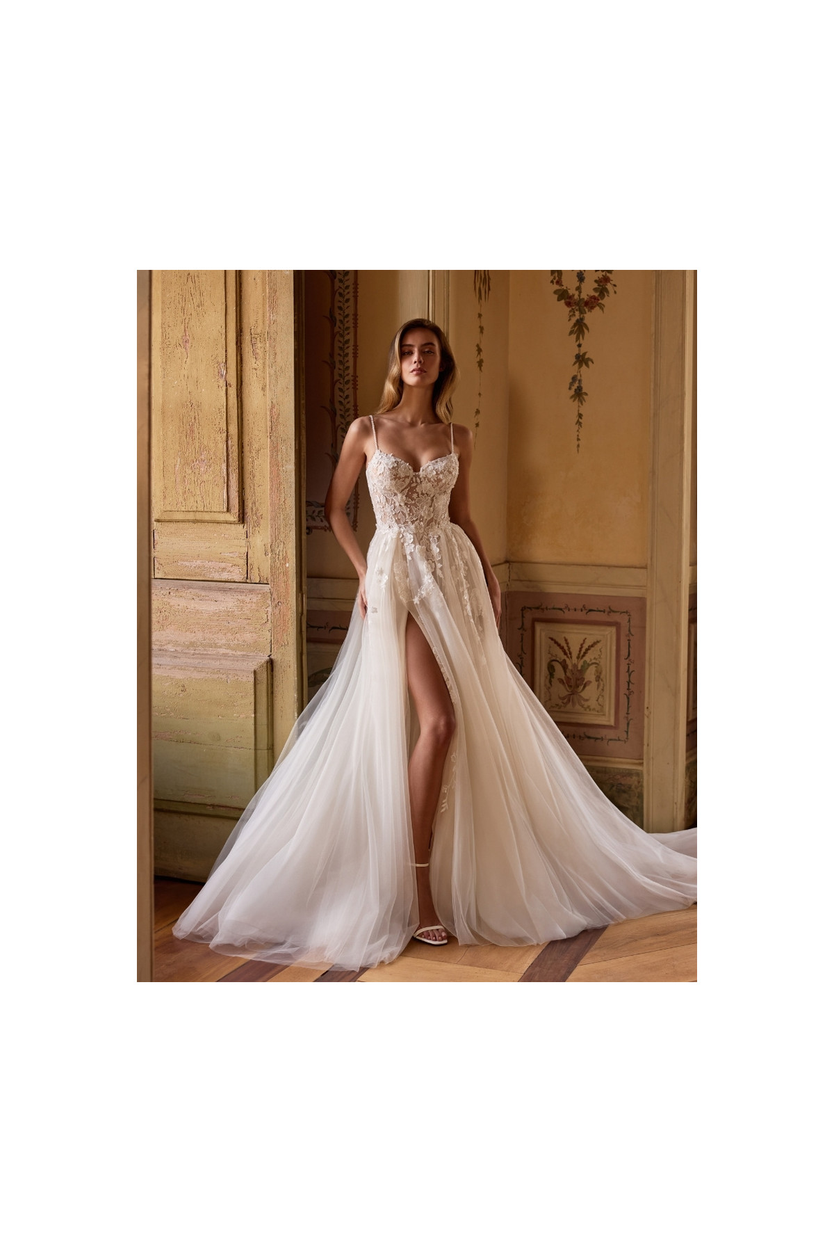 Yara Abito da sposa avorio a sirena in pizzo di Alberto Palatchi