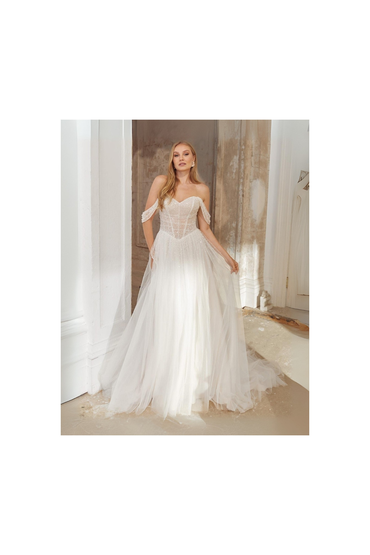 Kendra Abito da sposa avorio in tulle con spacco di Justin Alexander