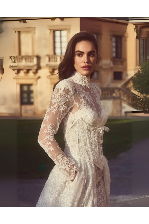 Abito da sposa avorio in pizzo a sirena di Alessandro Couture